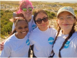 A group of people stand together